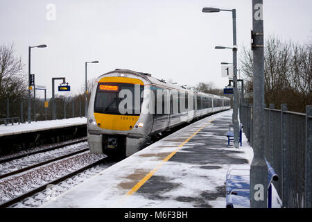 A Chiltern Railways class 168 train arriving at Warwick Parkway station in winter, Warwickshire, UK Stock Photo