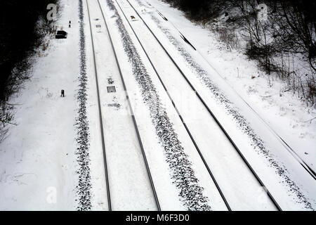 Railway tracks in snow, Warwickshire, UK Stock Photo