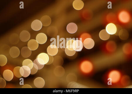 Abstract blurred interior decorated lighting in brown and orange color gradations Stock Photo