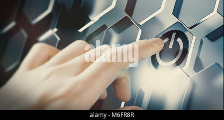 Finger pushing digital start button on a futuristic interface. Conceptual design of an innovative technology. Composite image between a hand photograp Stock Photo