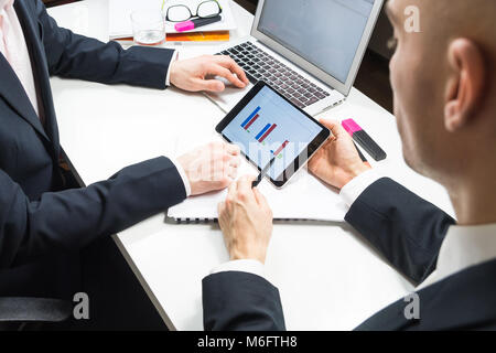 the decrease of business plan graph, hand paint a line Stock Photo - Alamy