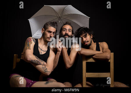 Three circus artists and friends having fun after their performance Stock Photo