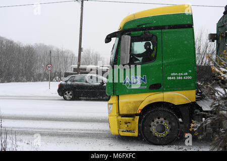 ABN truck driving in the snow delivering farm produce towards Salisbury on the A36 in treacherous conditions . Stock Photo