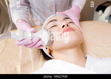 Getting Ultrasound Face Cleaning Stock Photo