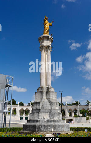 A huge column with a statue of Jesus Christ on top at the Sanctuary of Fátima, also known as Sanctuary of Our Lady of Fatima, Portugal Stock Photo