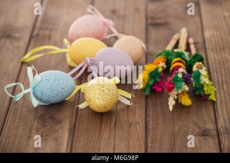 Easter eggs and decoration on wooden background Stock Photo