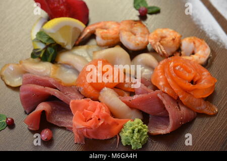 Mixed seafood salad in dish,The Thai food made form shrimp,fish, shellfish, squid Stock Photo