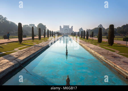 The territory of the Taj Mahal, the reverse side of the mausoleum. A park with swimming pool. Early morning, Agra, India. Stock Photo