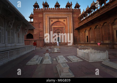 Muslim stone grave in Fatehpur Sikri. India. the inner courtyard of the Fort. An outdoor courtyard in the ancient Mughal city of Fatehpur Stock Photo