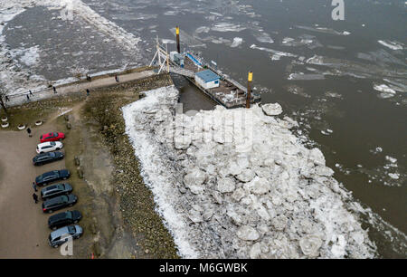 04 March 2018, Germany, Hamburg: Ice floes and pack ice surround a ferry terminal atthe Elbe river in front of the harbour entrance. (taken with drone) Photo: Axel Heimken/dpa Credit: dpa picture alliance/Alamy Live News Stock Photo