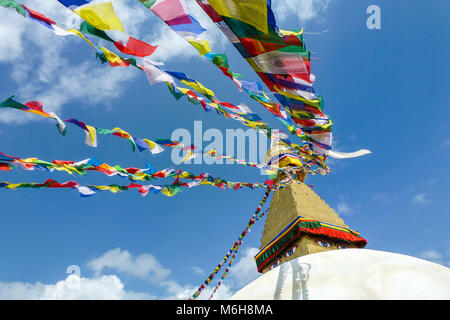 Scenic view of the dome of the Boudhanath Stupa, with prayer flags, Kathmandu, Nepal Stock Photo