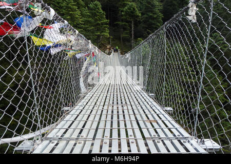 View of a suspension bridge in Tengboche, Everest Base Camp trek, Nepal Stock Photo