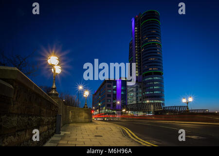 Traffic trails on the main Victoria Road into Leeds by Bridgewater Place Stock Photo