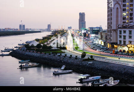 Ras Al Khaimah, United Arab Emirates - March 3, 2018: Ras Al Khaimah Corniche road and creek at dusk, the heart of northern emirate of the UAE Stock Photo