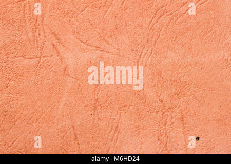 Texture of old brown paper with wrinkles, background for design with copy space text or image. Recyclable material, has small inclusions of cellulose Stock Photo