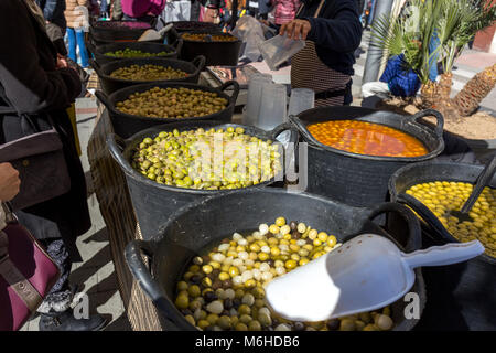 Green olive on the market in the street in town Palamos Stock Photo