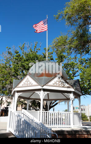 A landmark gazebo with American flag in the historic downtown square in Ocala Florida Stock Photo