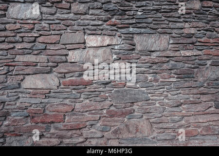 A fragment of wall covered with ceramic tiles Stock Photo