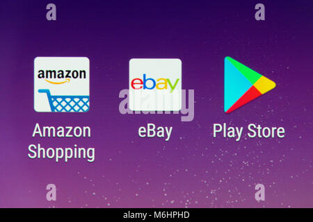 A closeup of the Amazon Shopping and eBay app icons on a smartphone screen Stock Photo