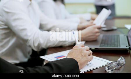Team of political experts working on election plan, discussing program together Stock Photo