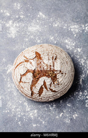 Bread rye, whole grain on a grey slate background. Top view. Stock Photo