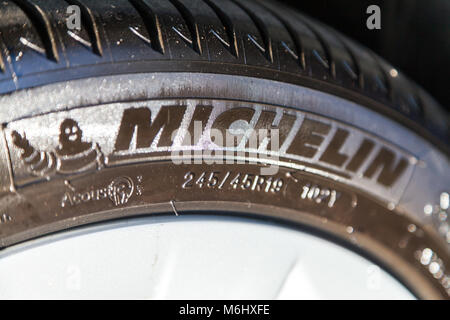 FUERTH / GERMANY - MARCH 4, 2018: Michelin logo on a tire. Michelin is a French tyre manufacturer based in Clermont-Ferrand in the Auvergne région of  Stock Photo