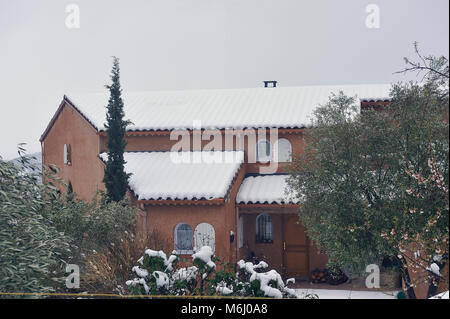 Snow-covered house in south-east France in Tornac in Gard department Stock Photo