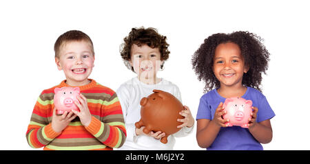 Three happy children with piggy-banks isolated on a white background Stock Photo