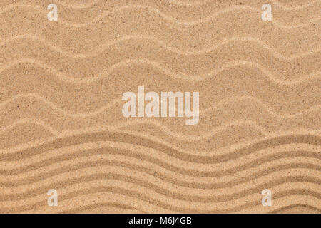 Zigzag and sand dunes, sand texture, background. View from above Stock Photo