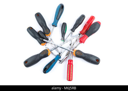 Set of used screwdrivers on a white background. Repairman tools, equipment. Construction tools. Stock Photo