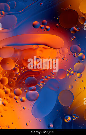 oil drops on a water surface abstract background. Stock Photo