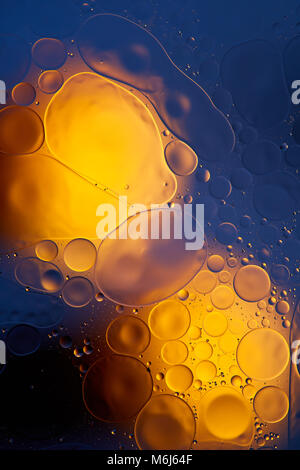 oil drops on a water surface abstract background. Stock Photo