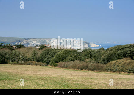 Landscape view looking towards Ballard Down on a sunny day in Swanage Bay, Swanage, Dorset, UK Stock Photo