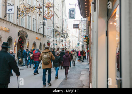 Austria, Salzburg, January 1, 2017: Getreidegasse street. A picturesque street on the territory of the old city, long considered to be the center of trade of Salzburg. Christmas holidays in Europe. Stock Photo
