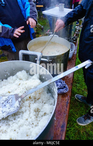 Hungry children in refugee camp, humanitarian food Stock Photo