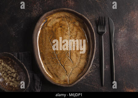 Beautiful vintage empty blue plates on a dark rusty background. Copy space, top view. Stock Photo