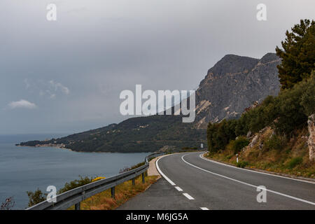 The D8 Road along the Adriatic Sea in Croatia on a cloudy spring day Stock Photo