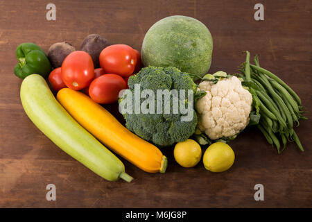 Vegetable:  Close up of  Mixed Vegetable Shot in Studio Isolated on Wooden Background Stock Photo