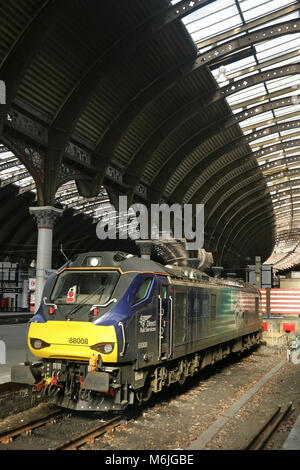 Direct Rail Services Class 88 electro-diesel locomotive 88008 'Ariadne', made by Stadler Rail Valencia (formerly Vossloh), at York station, UK. Stock Photo