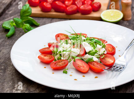 Healthy diet salad with arugula, mozzarella, mussels and vinaigrette ...