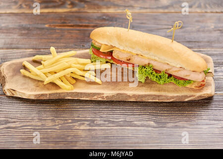 Hot dog with fresh vegetables. Stock Photo