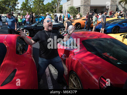 Boca Raton, Florida, USA. 4th Mar, 2018. Jason Bonham, Delray Beach, son of legendary Led Zeppelin drummer, John Bonham attends the Diamonds and Donuts Super Car Show in Boca Raton, Florida on March 4, 2018. Standing between Ferraris Bonham said ''It feels like when I was growing up and my father didn't have enough room in the garage for all of his Jaguar XK 150's, 120's, Maserati's and muscle cars.'' The monthly car show at Diamonds by Raymond Lee on North Federal Highway in Boca Raton features a lot full of American, imports and exotic cars. Each month the show raises money for a charity. Stock Photo