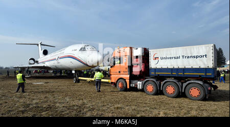 Enthusiasts from the Aviation Museum in Kunovice, Czech Republic moved the Tupolev Tu-154 former government aircraft, so called Nagano Express, to the new honorable place, on March 3, 2018. For the plane, which was hosted by Czech ice hockey players from the Nagano Olympics 1998, the museum built a new concrete platform. (CTK Photo/Dalibor Gluck) Stock Photo