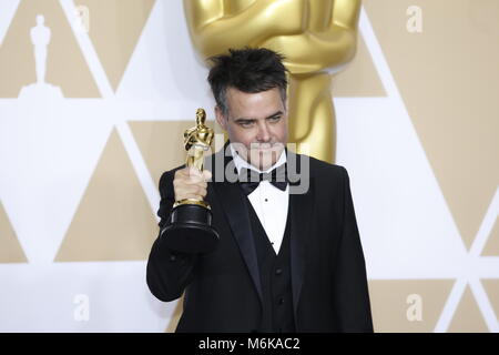 Los Angeles, USA. 4th Mar, 2018. Director Sebastian Lelio poses after winning the Best Foreign Language Film award for 'A Fantastic Woman' at press room of the 90th Academy Awards at the Dolby Theater in Los Angeles, the United States, on March 4, 2018. Credit: Li Ying/Xinhua/Alamy Live News Stock Photo