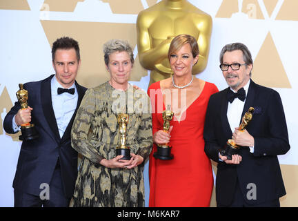 Los Angeles, USA. 4th Mar, 2018. Oscar winners Sam Rockwell, Francis McDormand, Allison Janney and Gary Oldman (L to R) pose at press room of the 90th Academy Awards at the Dolby Theater in Los Angeles, the United States, on March 4, 2018. Credit: Li Ying/Xinhua/Alamy Live News Stock Photo