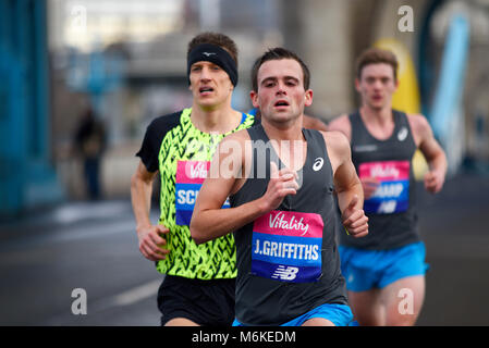 Josh Griffiths elite runner running in the Vitality Big Half marathon crossing Tower Bridge, London, UK Stock Photo