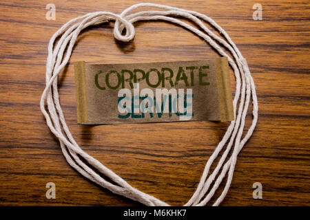 Conceptual hand writing text caption Corporate Service. Business concept for Csr Digital Content written on sticky note paper on dark wooden backgroun Stock Photo