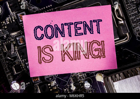 Conceptual hand writing text caption inspiration showing Content Is King. Business concept for Online Internet Data Written on sticky, computer main b Stock Photo