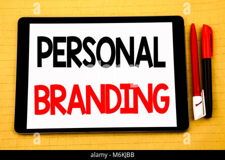 Conceptual handwriting text caption inspiration showing Personal Branding. Business concept for Brand Building Written on tablet, wooden background wi Stock Photo