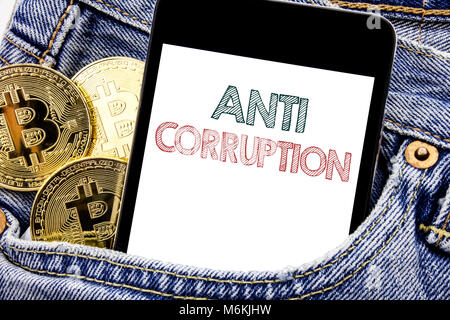 Hand writing text caption inspiration showing Anti Corruption. Business concept for Bribery Corrupt Text Written phone mobile phone, cellphone placed  Stock Photo
